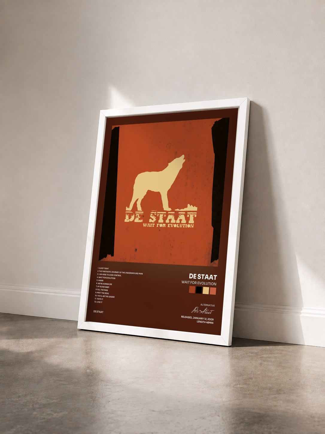 #blanc Tableau de l'album Wait For Evolution de De Staat vu de trois quarts, cadre blanc