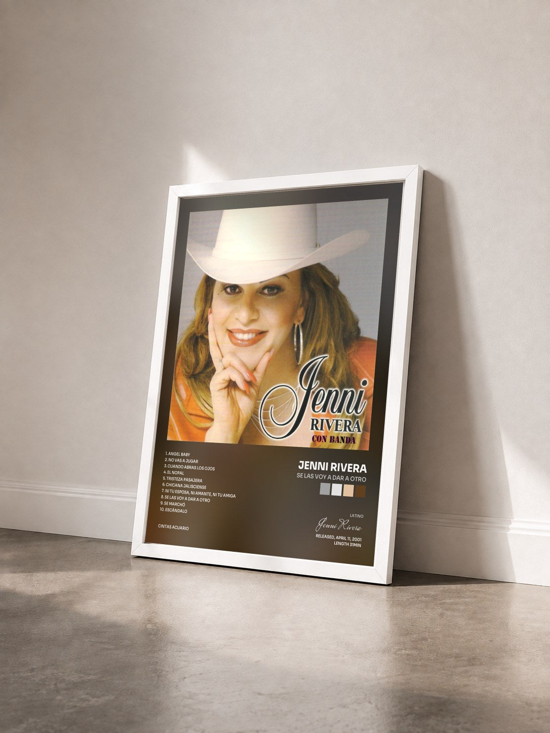 #blanc Tableau de l'album Se las Voy a Dar a Otro de Jenni Rivera vu de trois quarts, cadre blanc