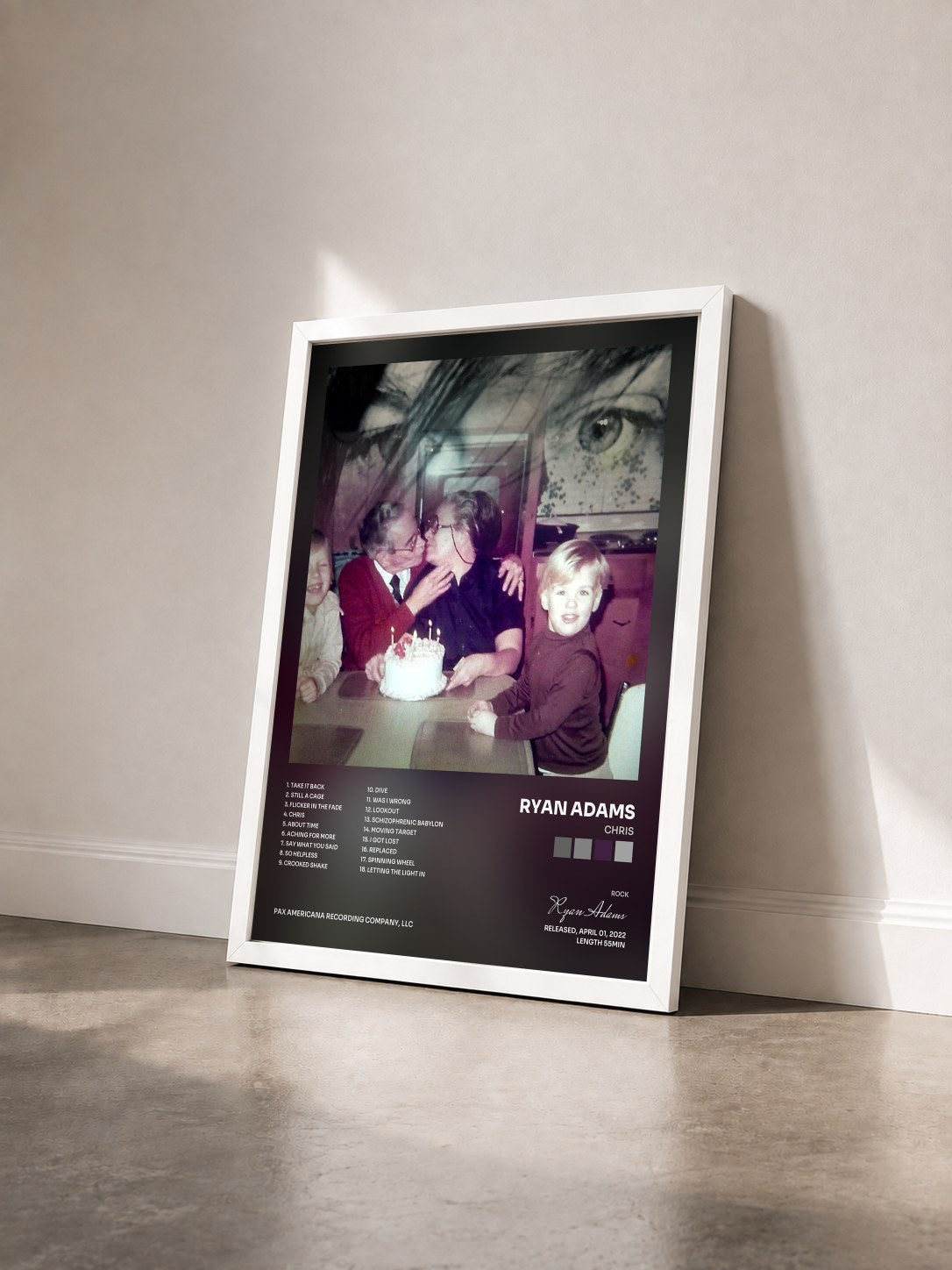 #blanc Tableau de l'album Chris de Ryan Adams vu de trois quarts, cadre blanc