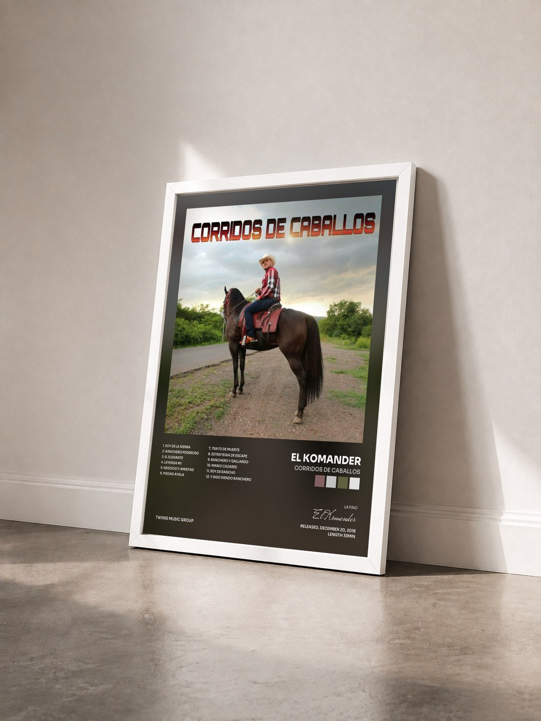 #blanc Tableau de l'album Corridos De Caballos de El Komander vu de trois quarts, cadre blanc