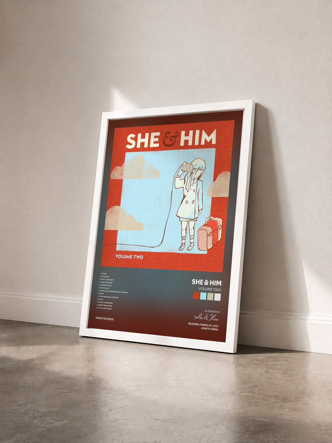 #blanc Tableau de l'album Volume Two de She & Him vu de trois quarts, cadre blanc