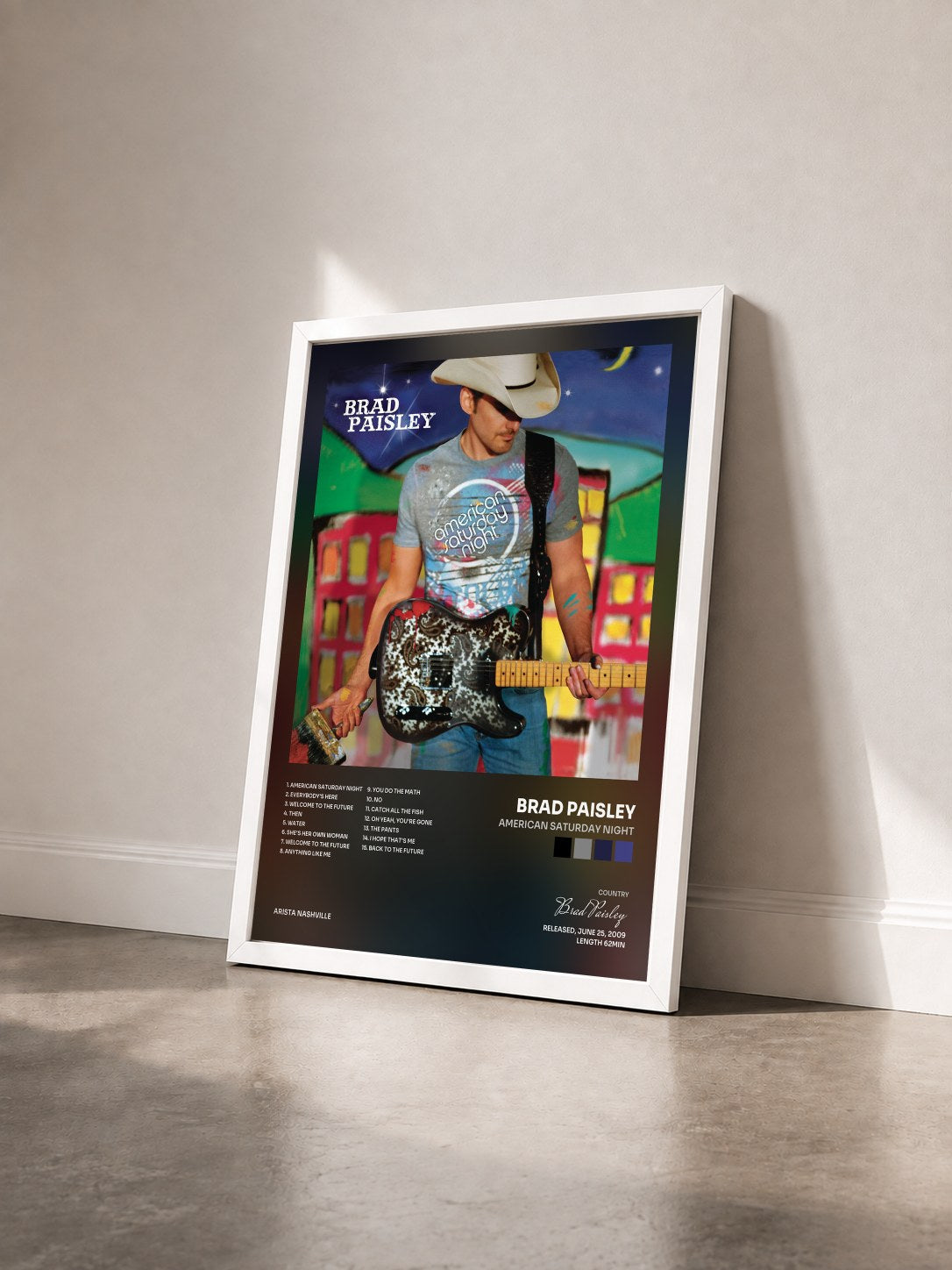 #blanc Tableau de l'album American Saturday Night de Brad Paisley vu de trois quarts, cadre blanc
