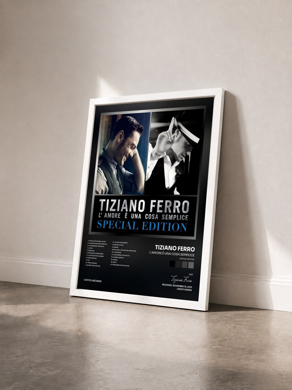 #blanc Tableau de l'album L'amore è una cosa semplice (Special Edition) de Tiziano Ferro vu de trois quarts, cadre blanc
