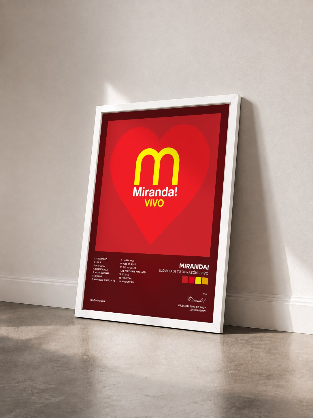 #blanc Tableau de l'album El Disco de Tu Corazón - Vivo de Miranda! vu de trois quarts, cadre blanc