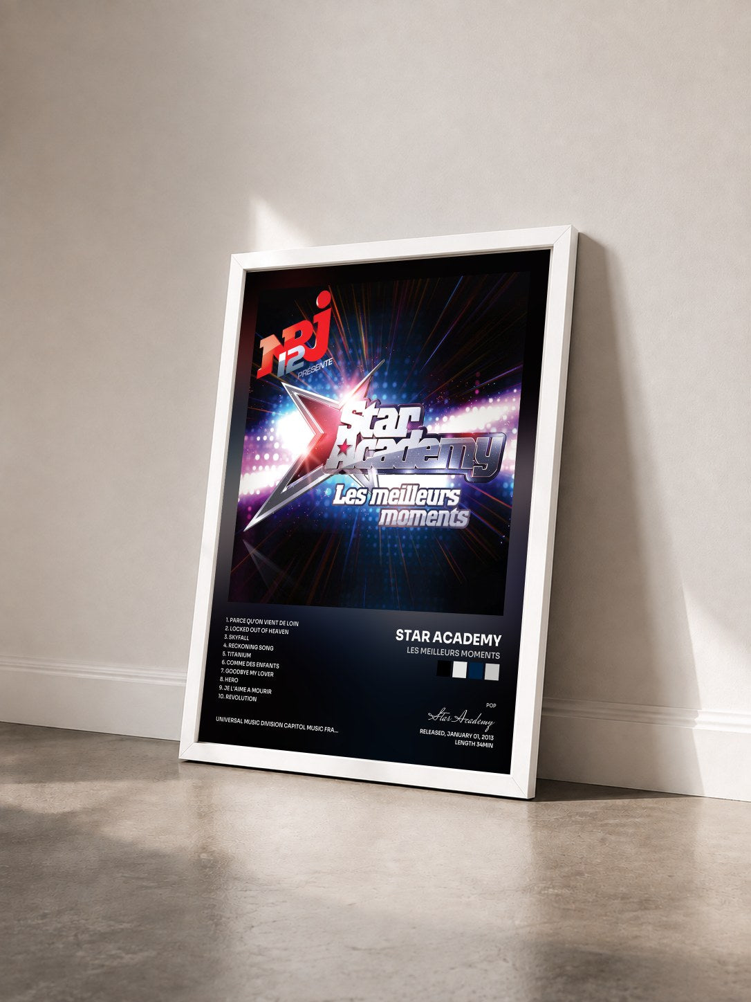 #blanc Tableau de l'album Les Meilleurs Moments de Star Academy vu de trois quarts, cadre blanc