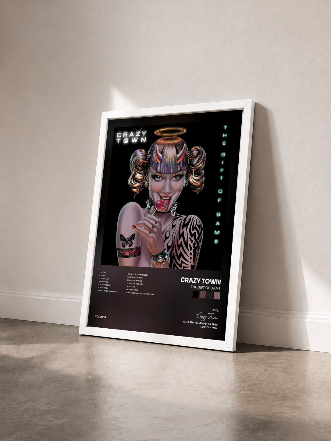 #blanc Tableau de l'album The Gift Of Game de Crazy Town vu de trois quarts, cadre blanc