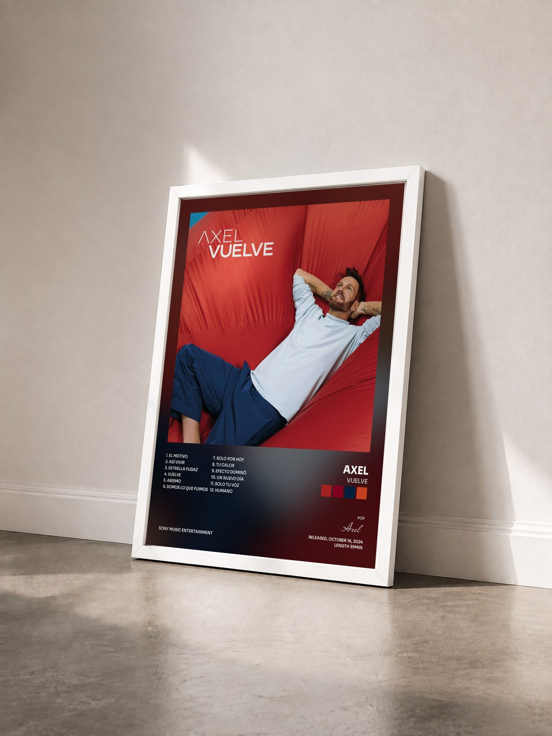 #blanc Tableau de l'album Vuelve de Axel vu de trois quarts, cadre blanc