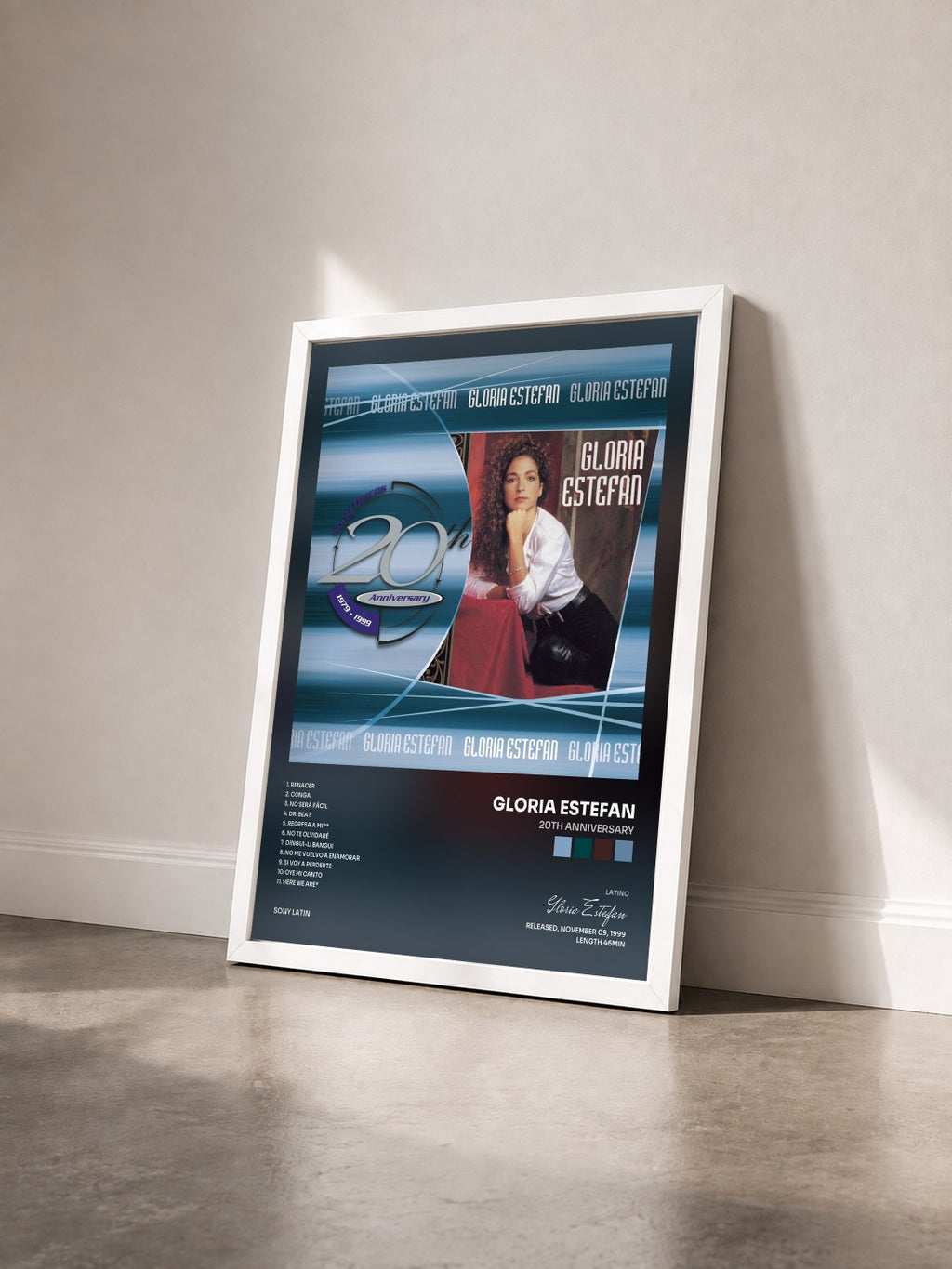 #blanc Tableau de l'album 20th Anniversary de Gloria Estefan vu de trois quarts, cadre blanc
