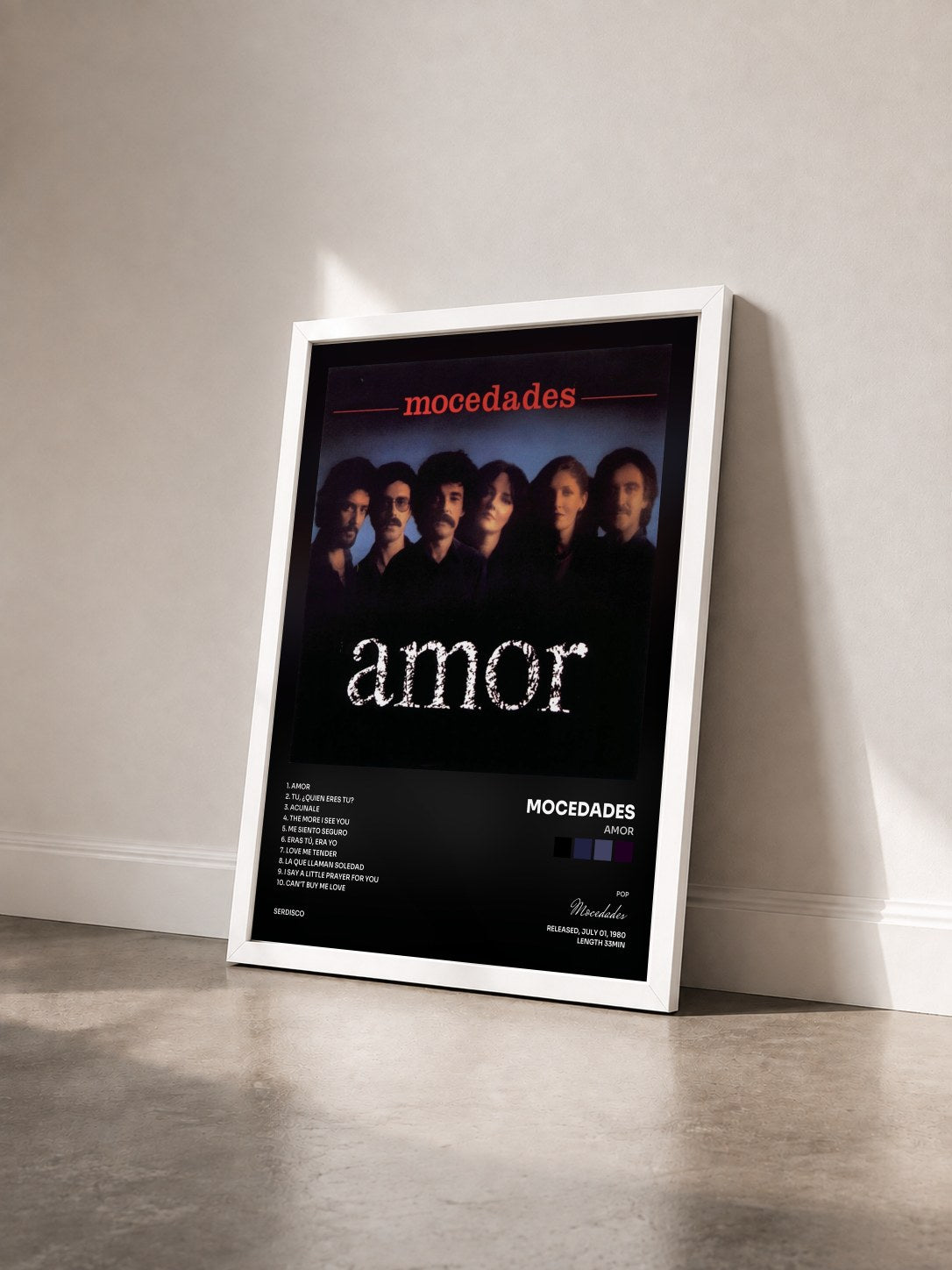 #blanc Tableau de l'album Amor de Mocedades vu de trois quarts, cadre blanc
