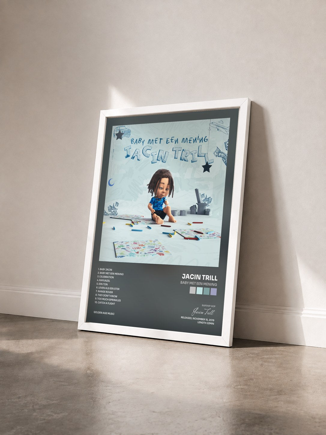 #blanc Tableau de l'album Baby met een mening de Jacin Trill vu de trois quarts, cadre blanc