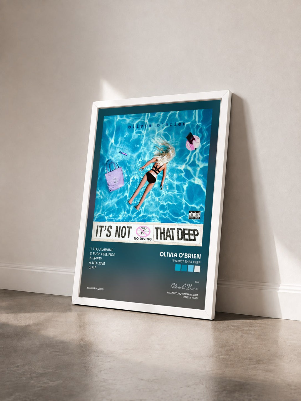 #blanc Tableau de l'album It's Not That Deep de Olivia O'Brien vu de trois quarts, cadre blanc