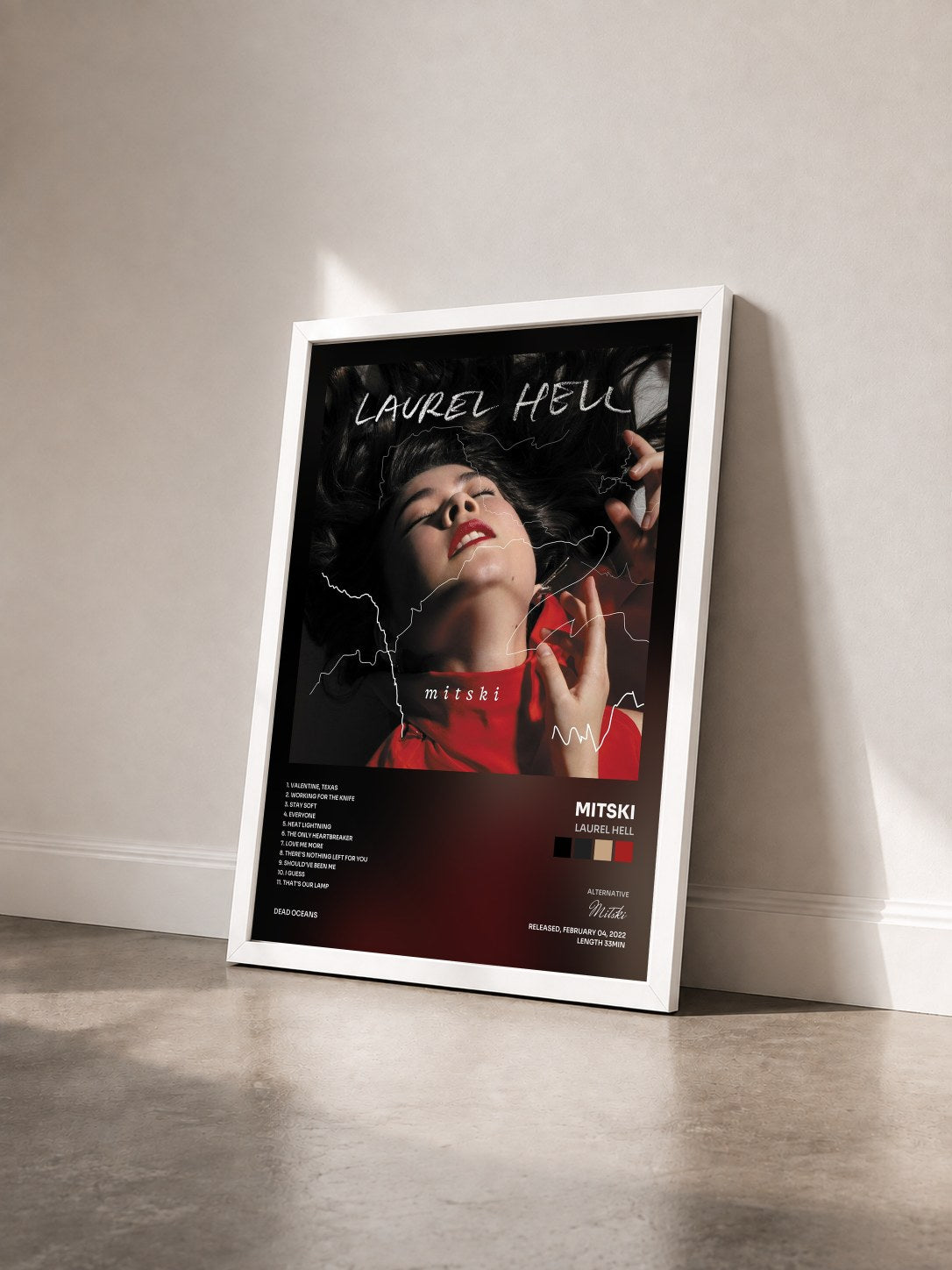 #blanc Tableau de l'album Laurel Hell de Mitski vu de trois quarts, cadre blanc