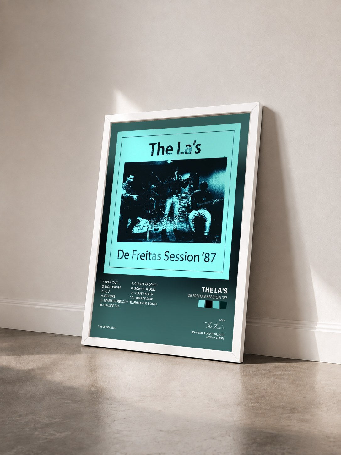 #blanc Tableau de l'album De Freitas Session '87 de The La's vu de trois quarts, cadre blanc
