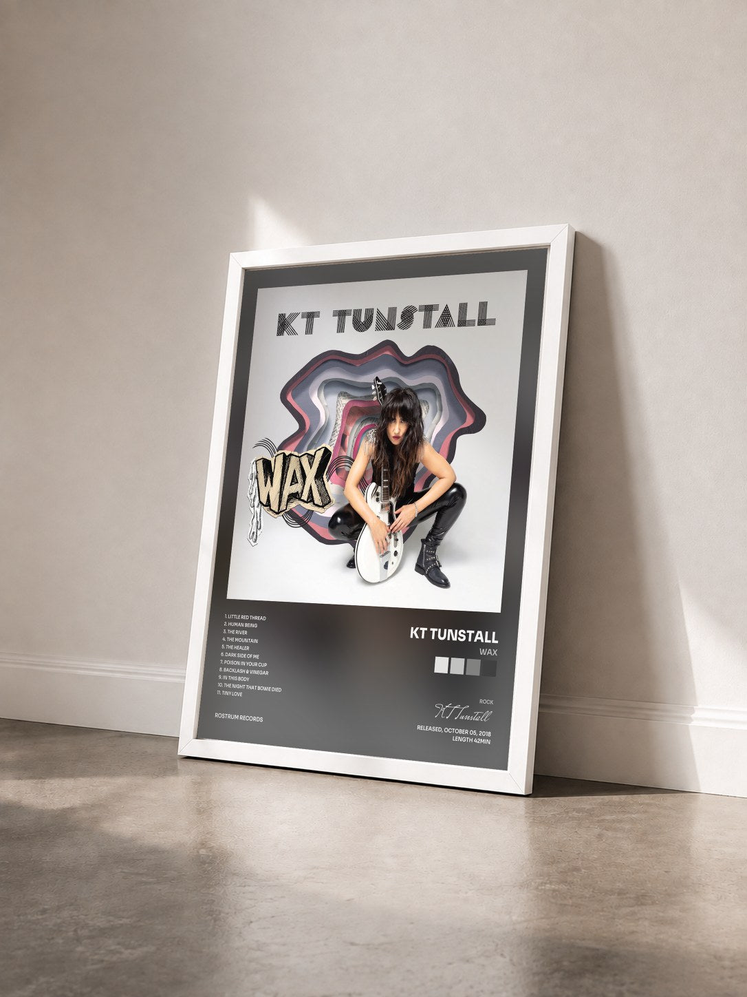 #blanc Tableau de l'album WAX de KT Tunstall vu de trois quarts, cadre blanc