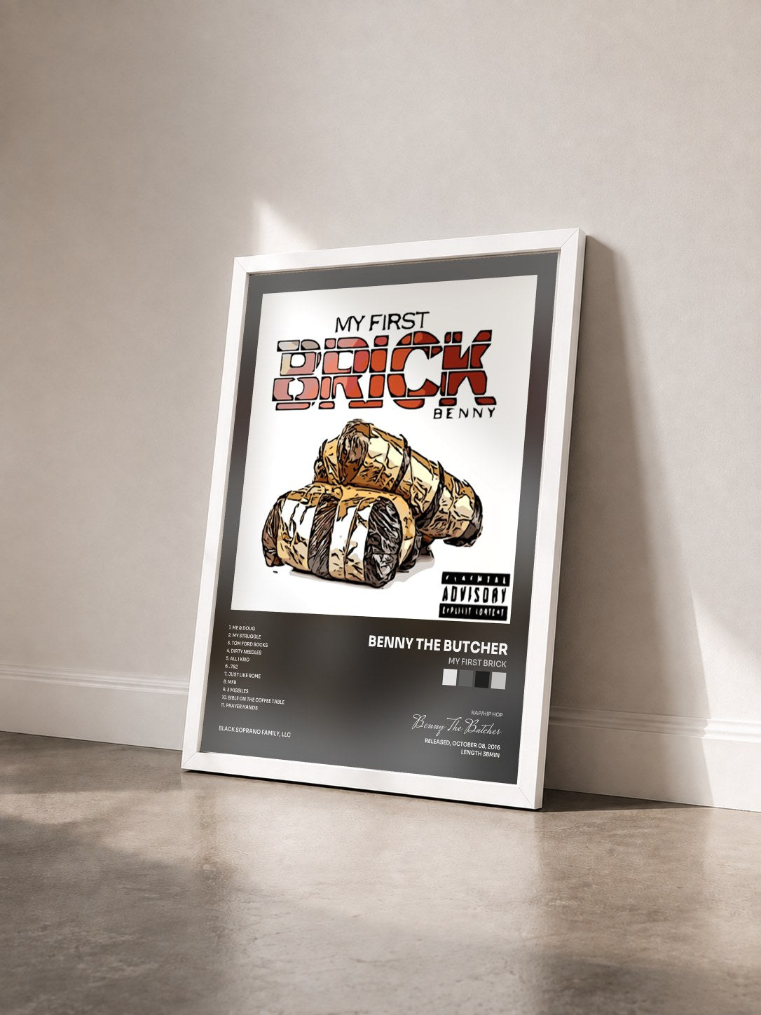 #blanc Tableau de l'album My First Brick de Benny The Butcher vu de trois quarts, cadre blanc