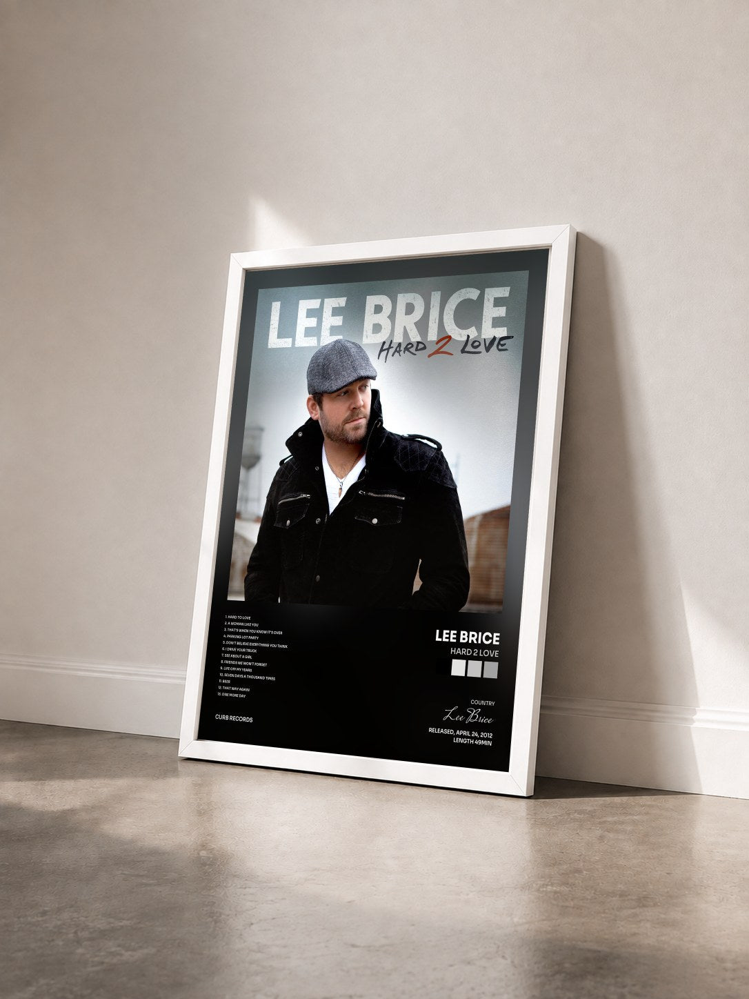 #blanc Tableau de l'album Hard 2 Love de Lee Brice vu de trois quarts, cadre blanc