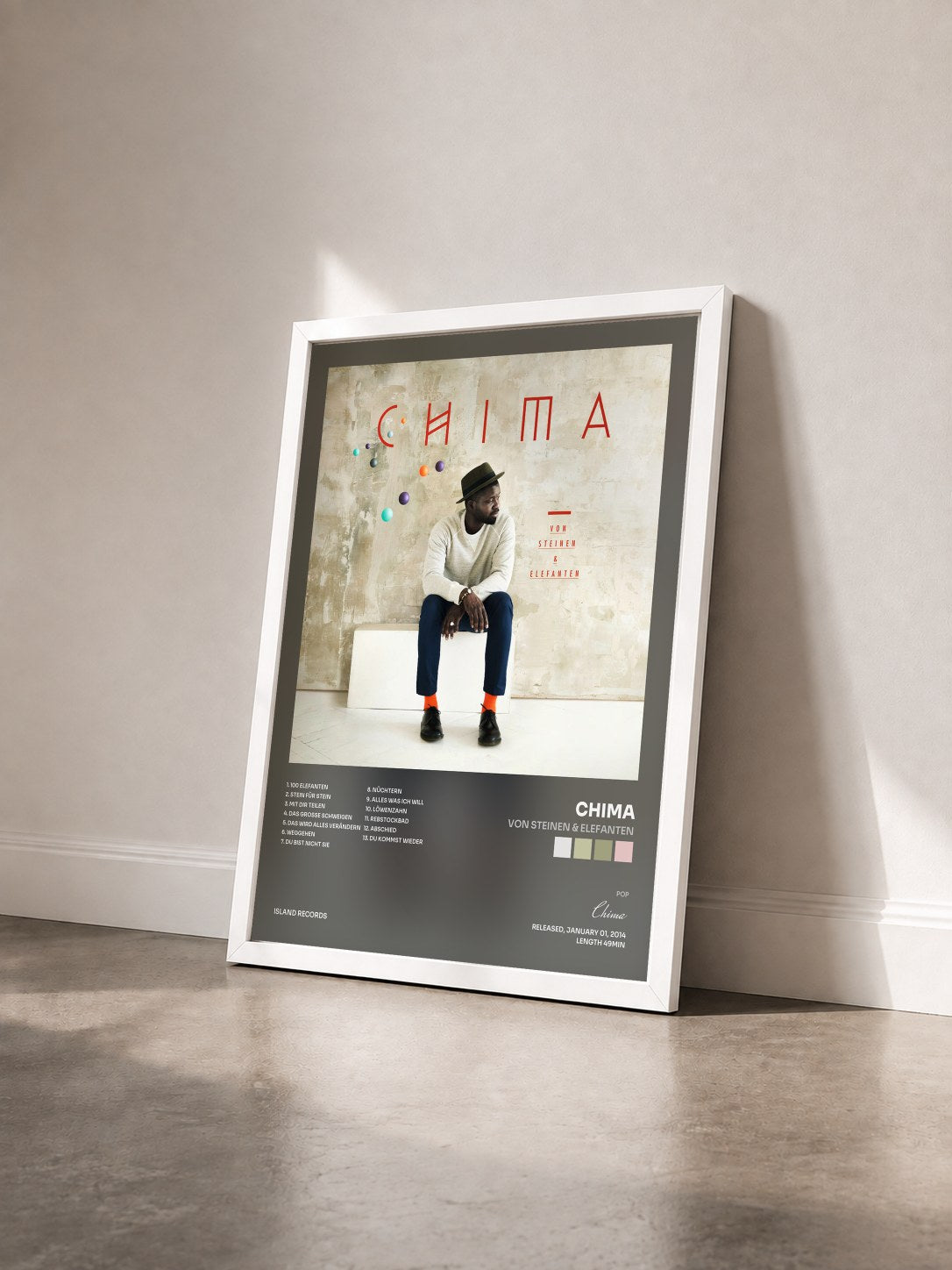 #blanc Tableau de l'album Von Steinen & Elefanten de Chima vu de trois quarts, cadre blanc
