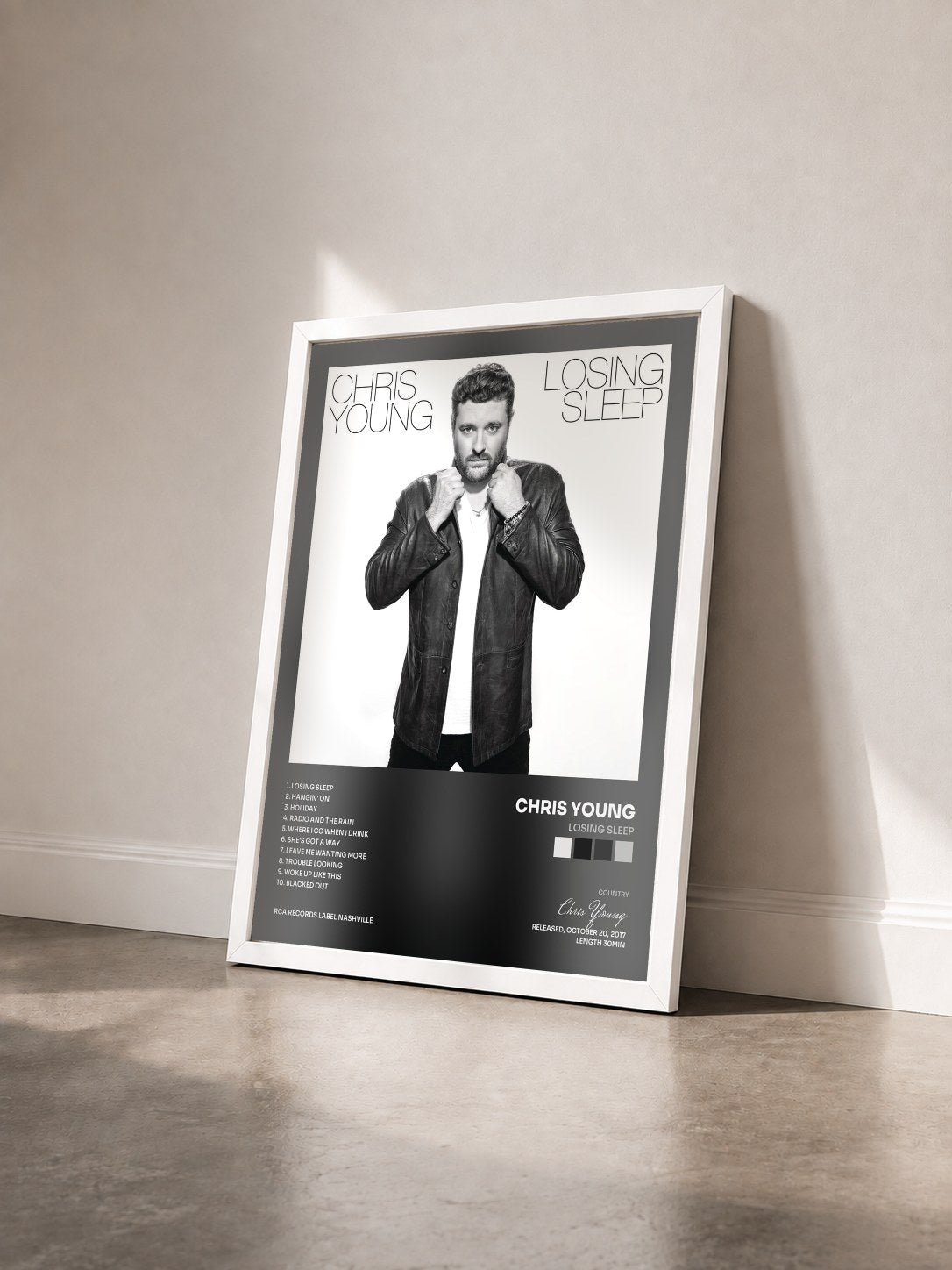 #blanc Tableau de l'album Losing Sleep de Chris Young vu de trois quarts, cadre blanc