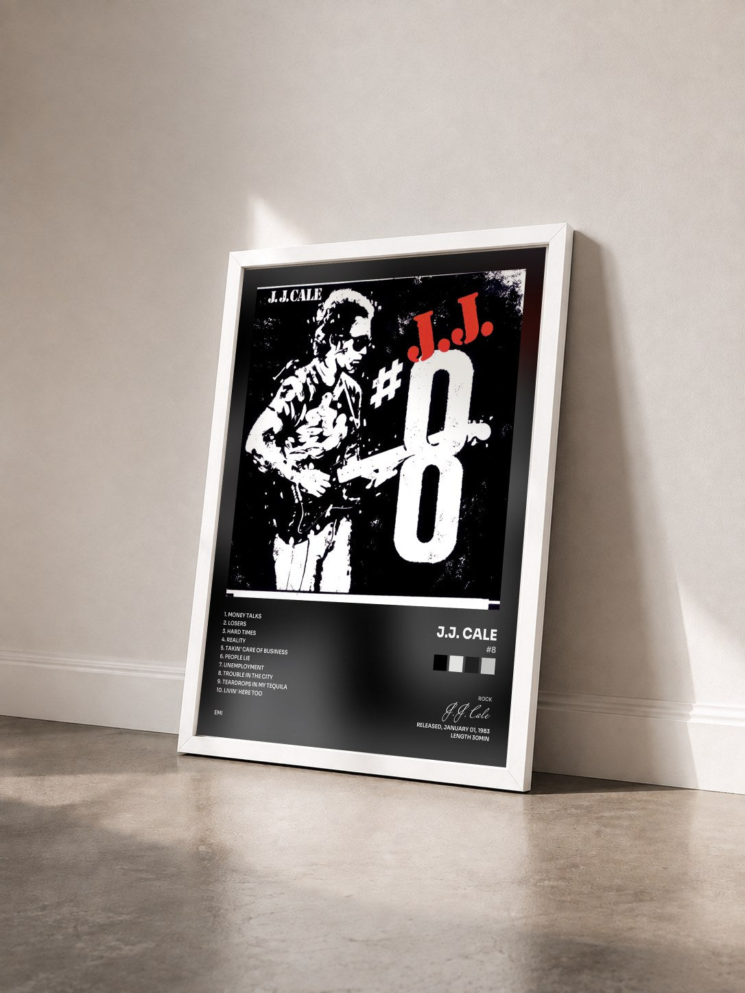 #blanc Tableau de l'album #8 de J.J. Cale vu de trois quarts, cadre blanc