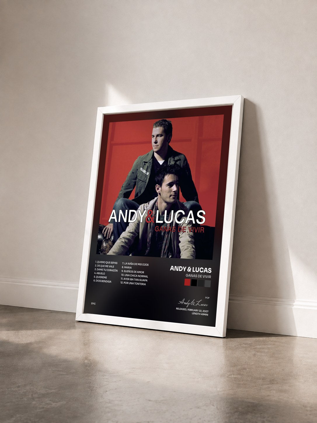 #blanc Tableau de l'album Ganas De Vivir de Andy & Lucas vu de trois quarts, cadre blanc