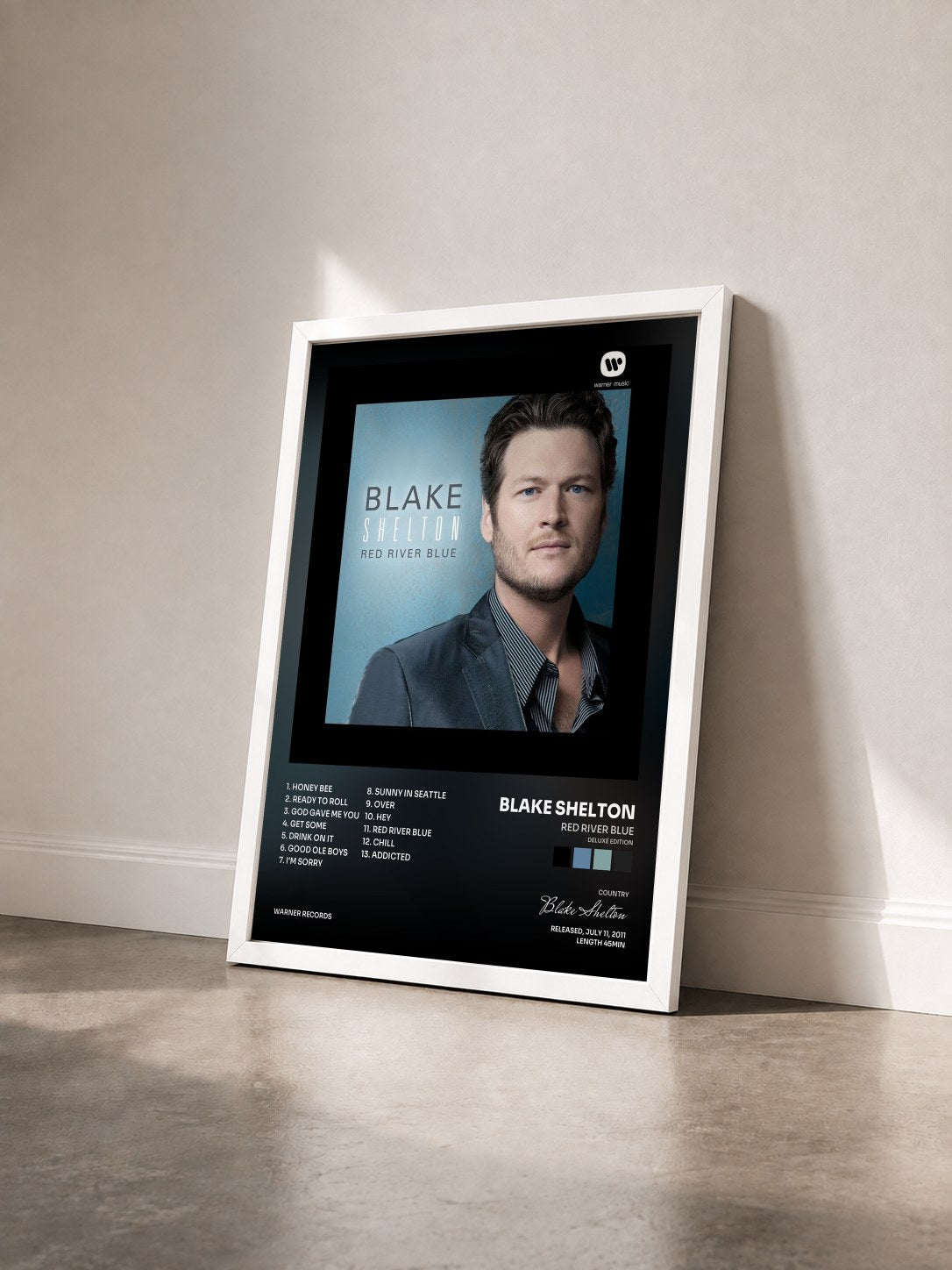 #blanc Tableau de l'album Red River Blue (Deluxe Edition) de Blake Shelton vu de trois quarts, cadre blanc