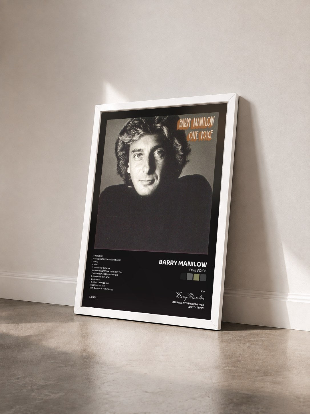 #blanc Tableau de l'album One Voice de Barry Manilow vu de trois quarts, cadre blanc