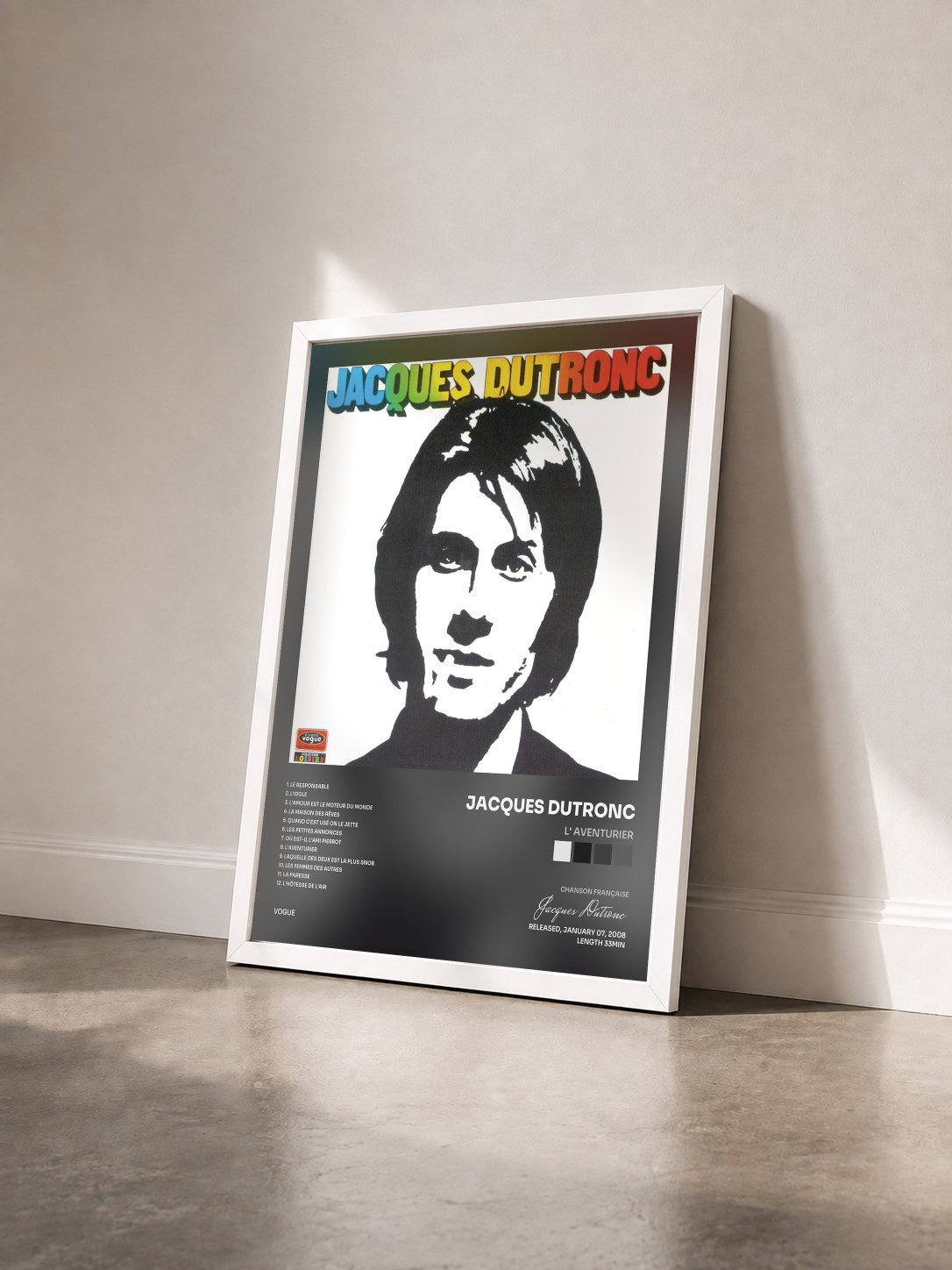 #blanc Tableau de l'album L' aventurier de Jacques Dutronc vu de trois quarts, cadre blanc
