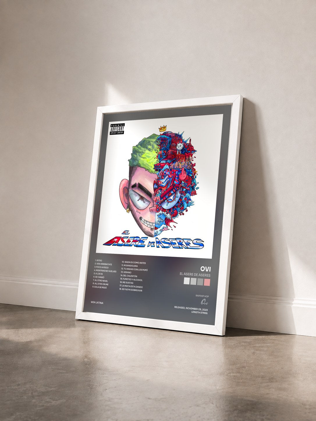 #blanc Tableau de l'album El Asere de Aseres de Ovi vu de trois quarts, cadre blanc