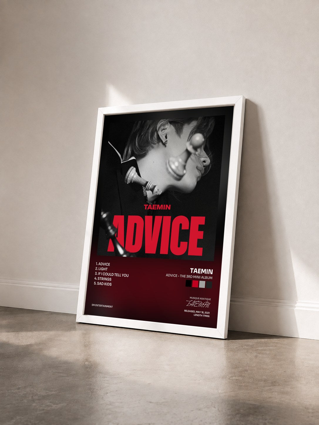 #blanc Tableau de l'album Advice - The 3rd Mini Album de TAEMIN vu de trois quarts, cadre blanc