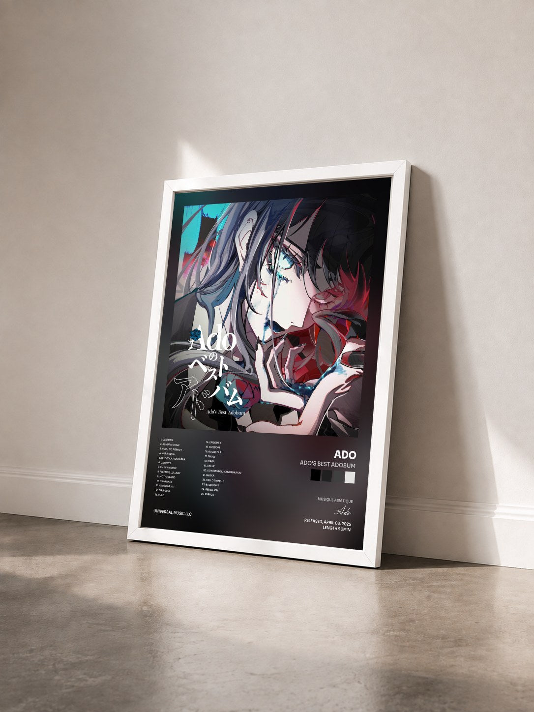 #blanc Tableau de l'album Ado's Best Adobum de Ado vu de trois quarts, cadre blanc