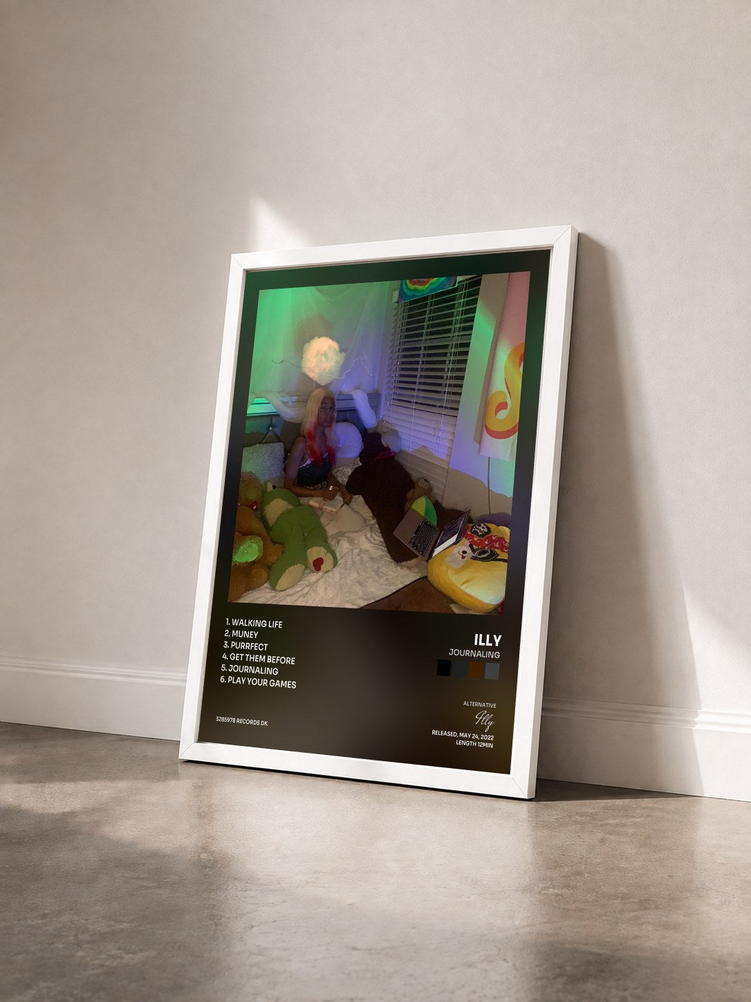 #blanc Tableau de l'album journaling de Illy vu de trois quarts, cadre blanc