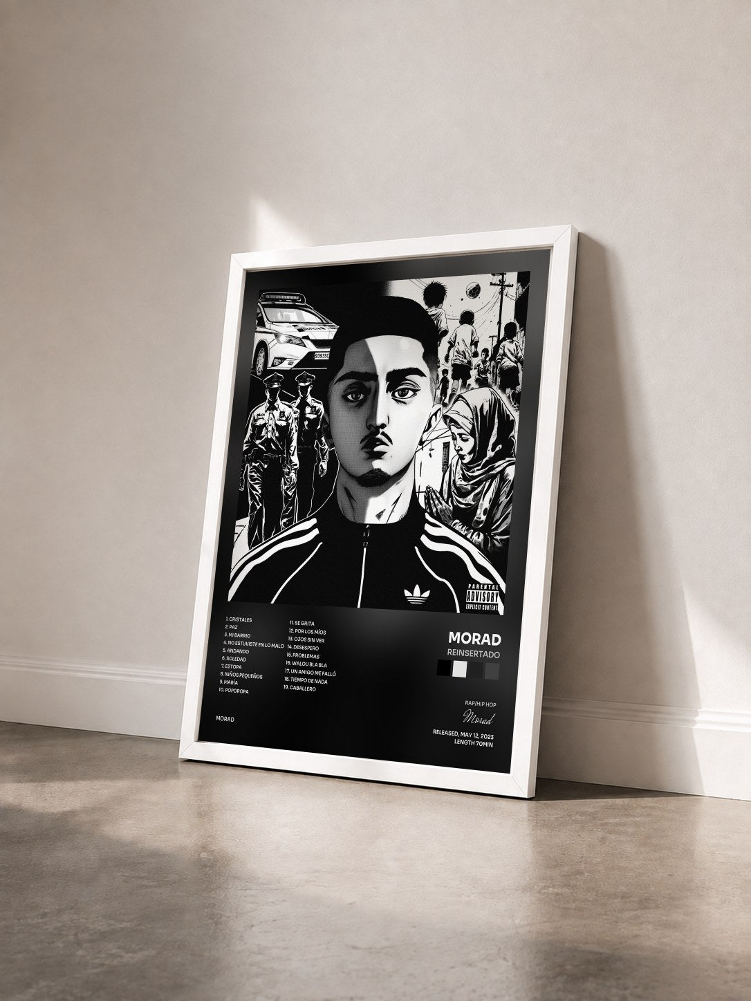 #blanc Tableau de l'album Reinsertado de Morad vu de trois quarts, cadre blanc