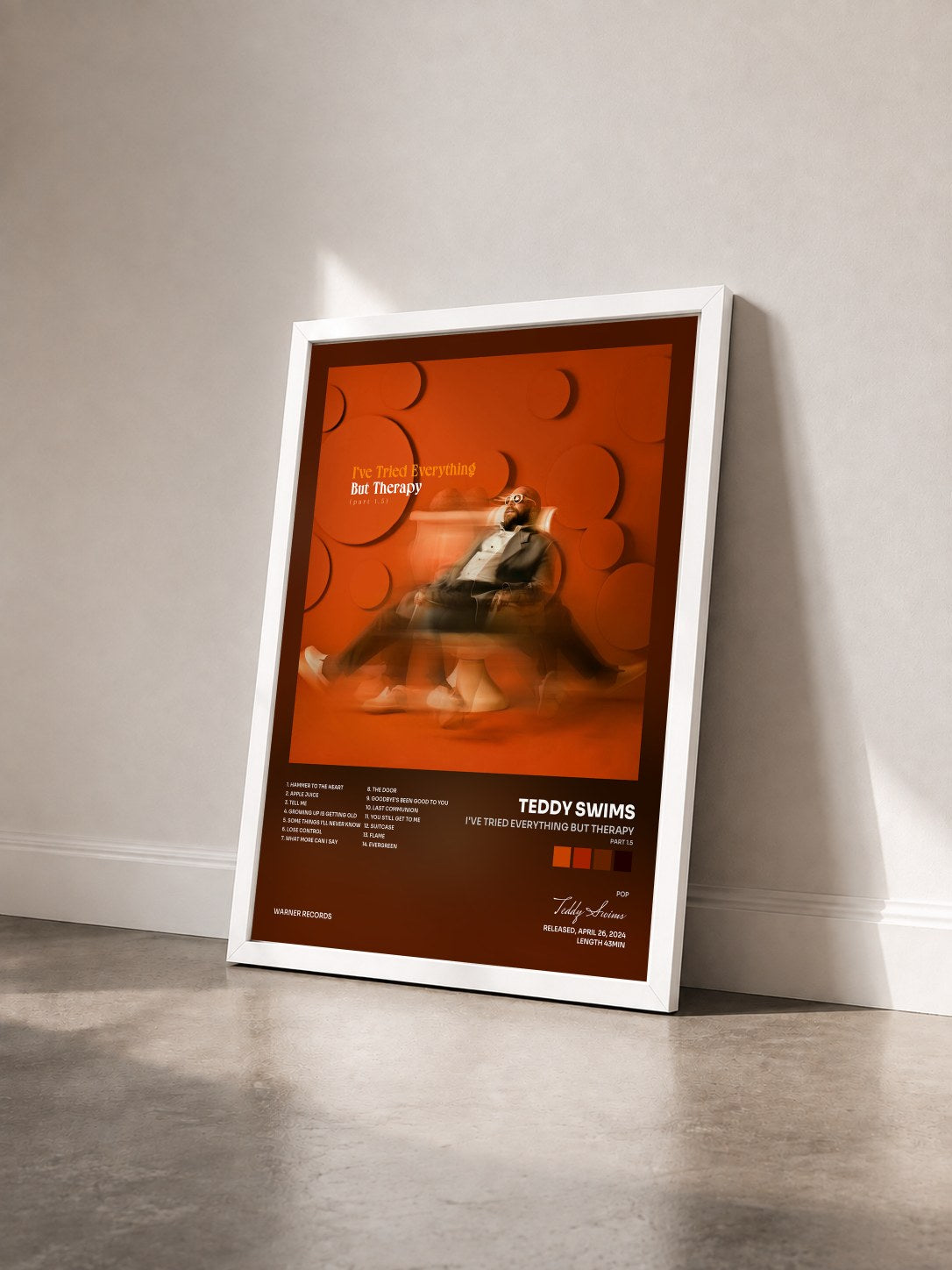#blanc Tableau de l'album I've Tried Everything But Therapy (Part 1.5) de Teddy Swims vu de trois quarts, cadre blanc