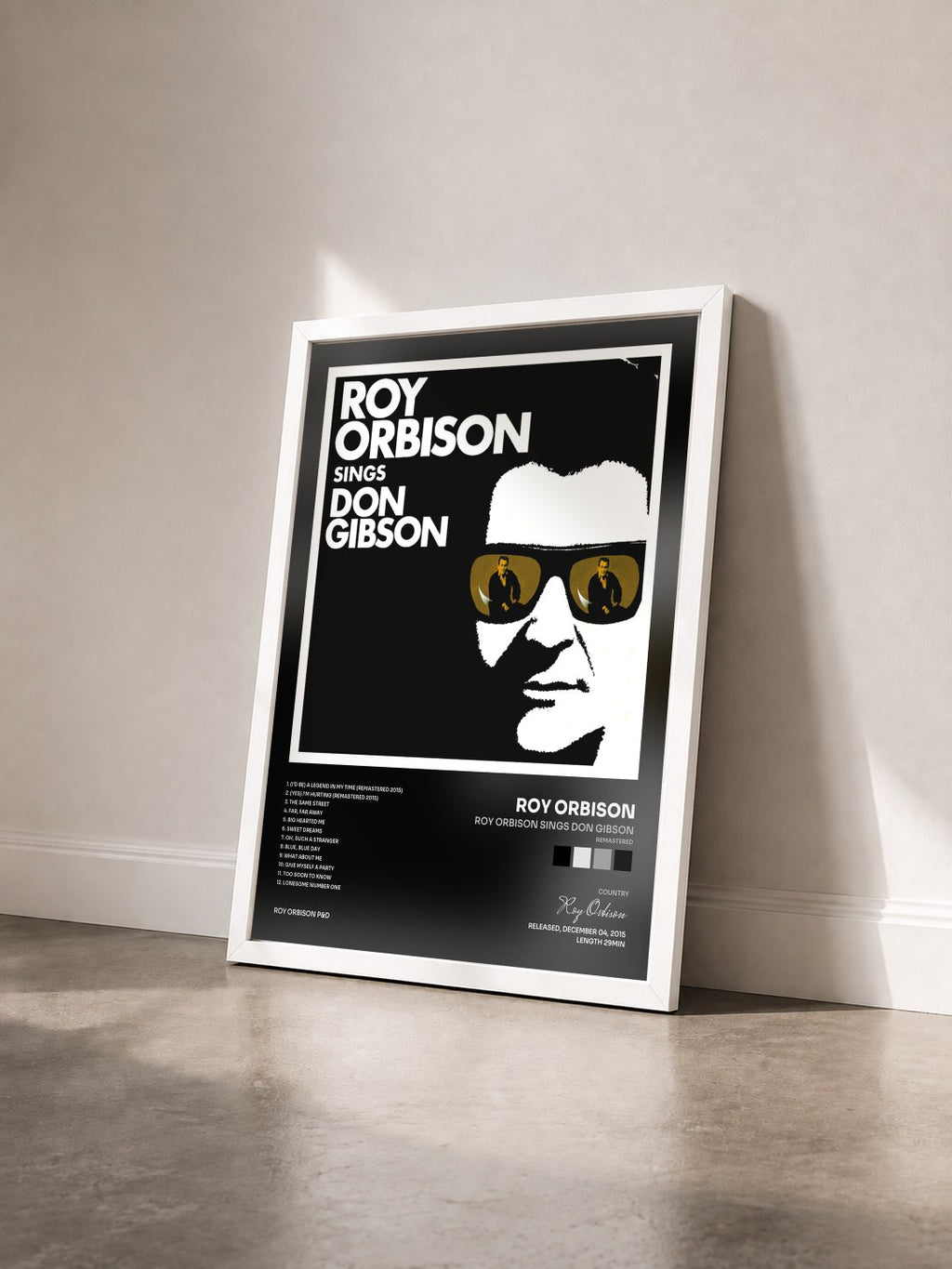 #blanc Roy Orbison Sings Don Gibson (Remastered) by Roy Orbison as a framed art print seen at an angle, white frame