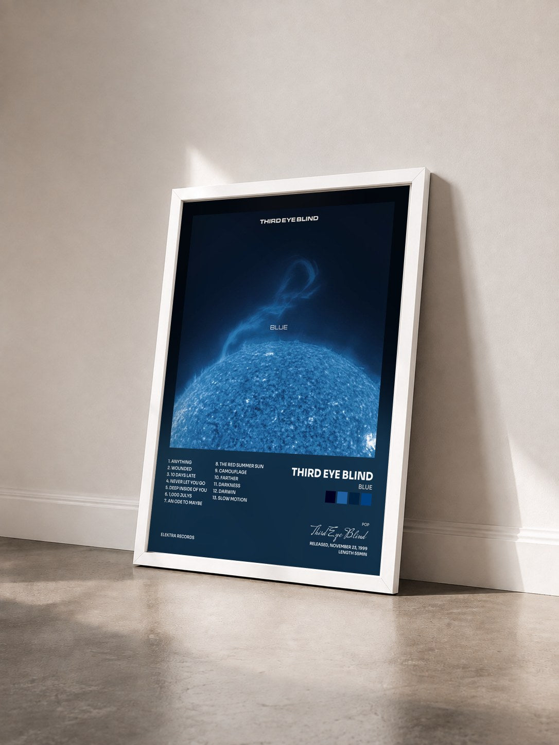 #blanc Tableau de l'album Blue de Third Eye Blind vu de trois quarts, cadre blanc