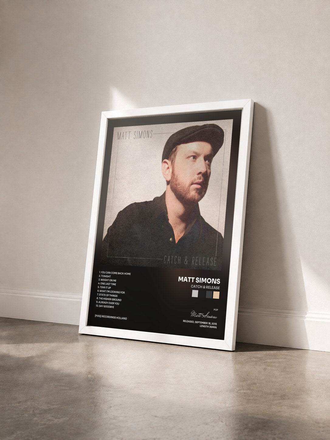 #blanc Tableau de l'album Catch & Release de Matt Simons vu de trois quarts, cadre blanc