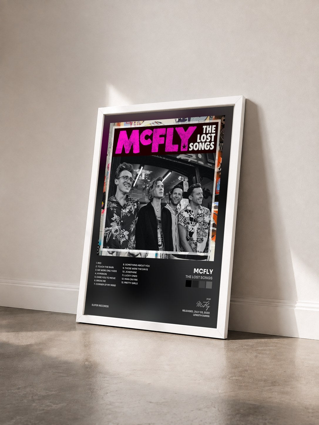 #blanc Tableau de l'album The Lost Songs de McFly vu de trois quarts, cadre blanc