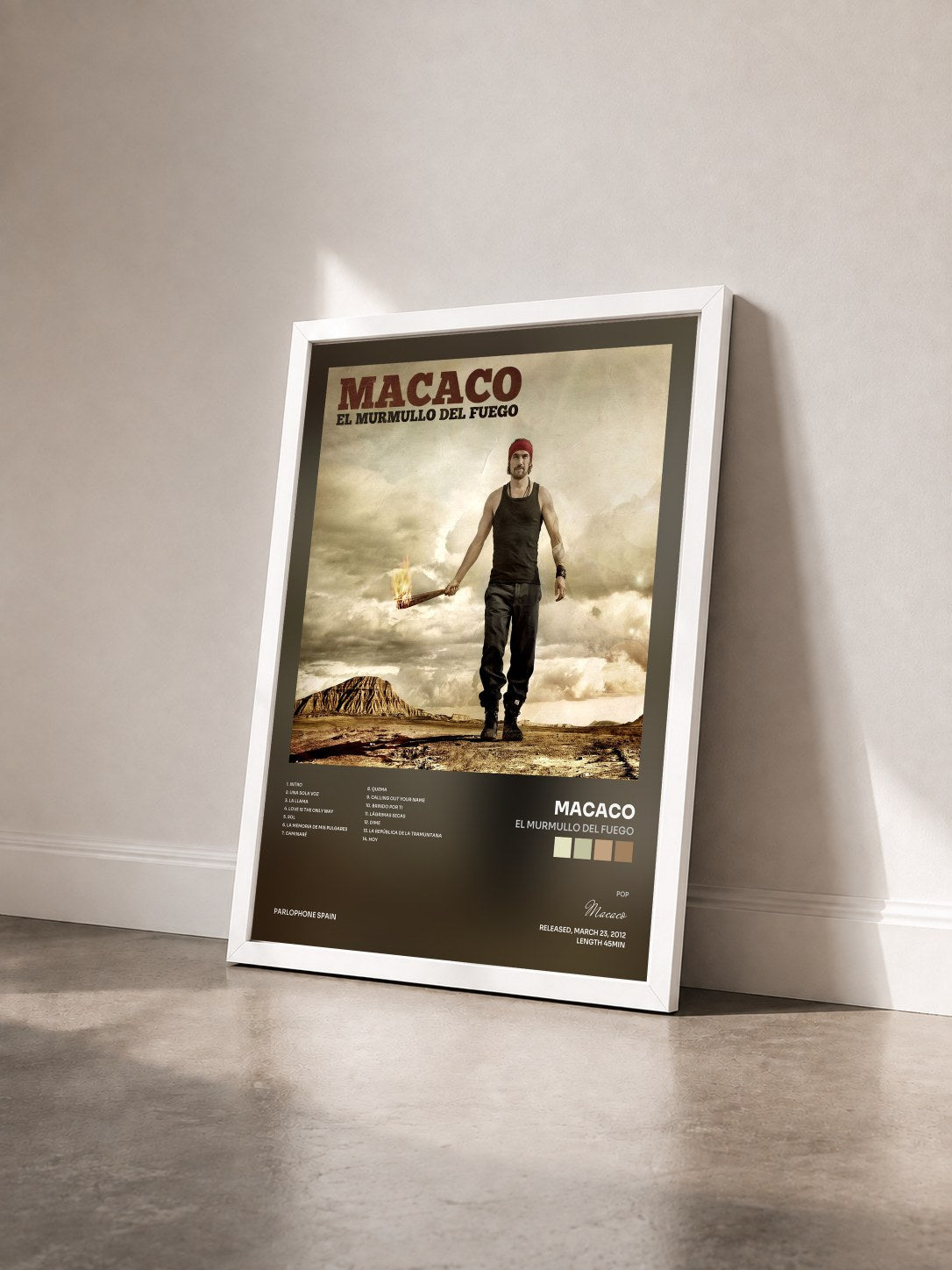 #blanc Tableau de l'album El Murmullo Del Fuego de Macaco vu de trois quarts, cadre blanc