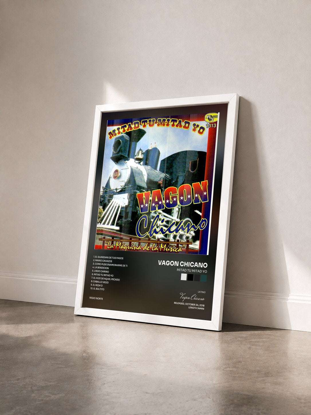 #blanc Tableau de l'album Mitad Tu Mitad Yo de Vagon Chicano vu de trois quarts, cadre blanc