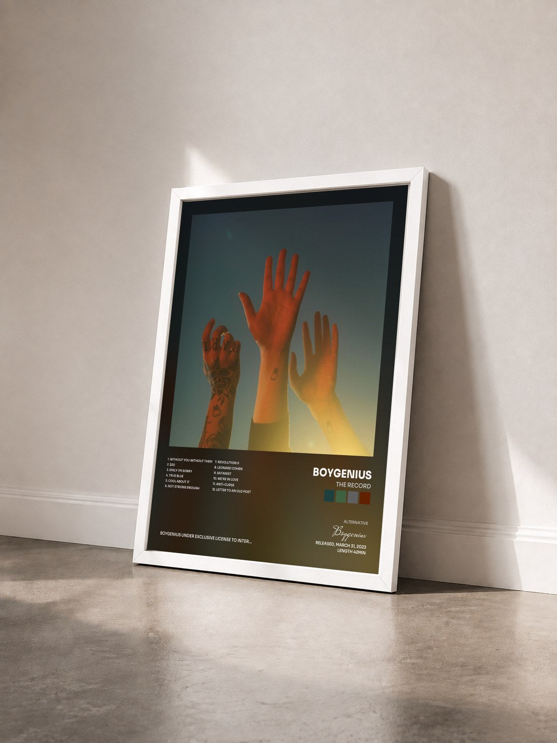 #blanc Tableau de l'album the record de Boygenius vu de trois quarts, cadre blanc