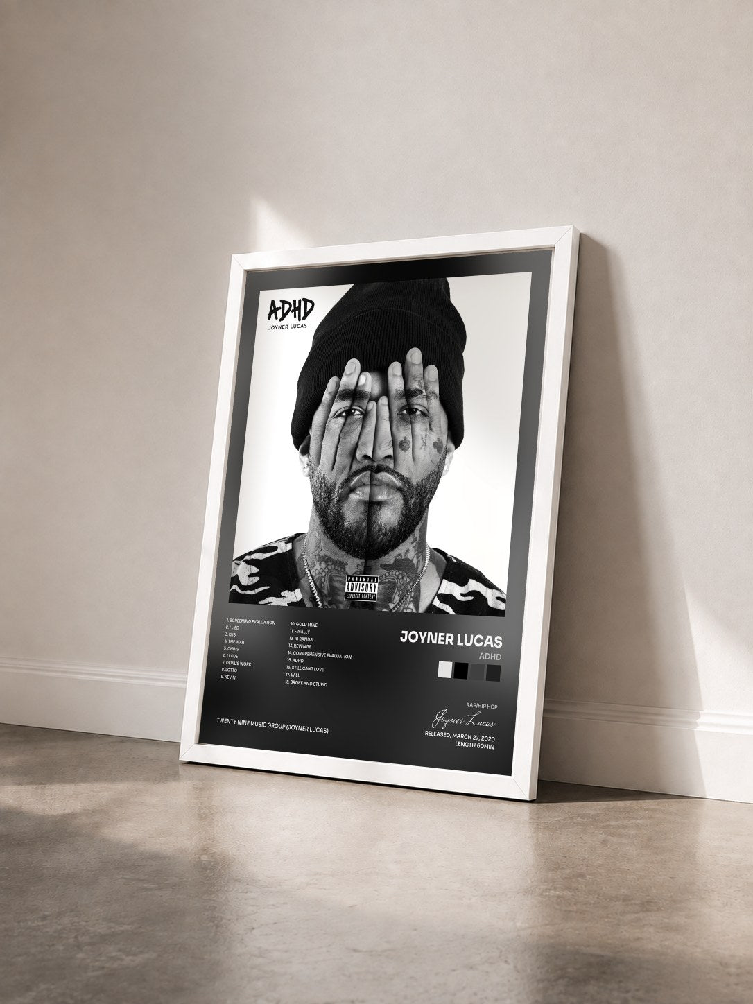 #blanc Tableau de l'album ADHD de Joyner Lucas vu de trois quarts, cadre blanc