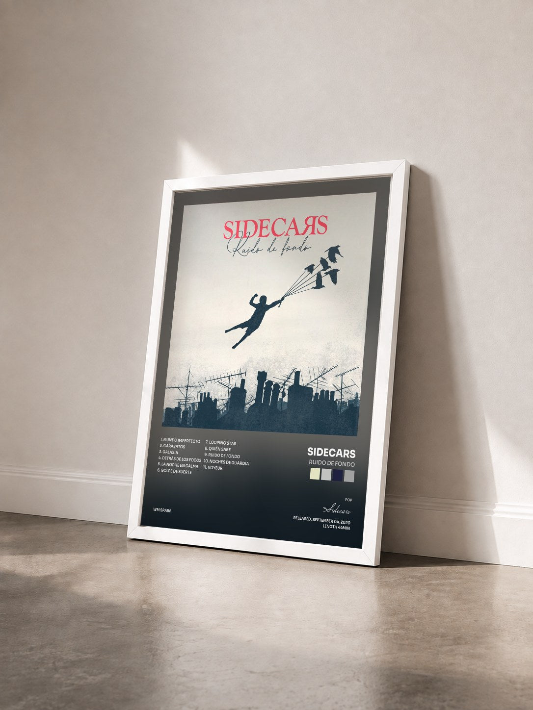 #blanc Tableau de l'album Ruido de fondo de Sidecars vu de trois quarts, cadre blanc