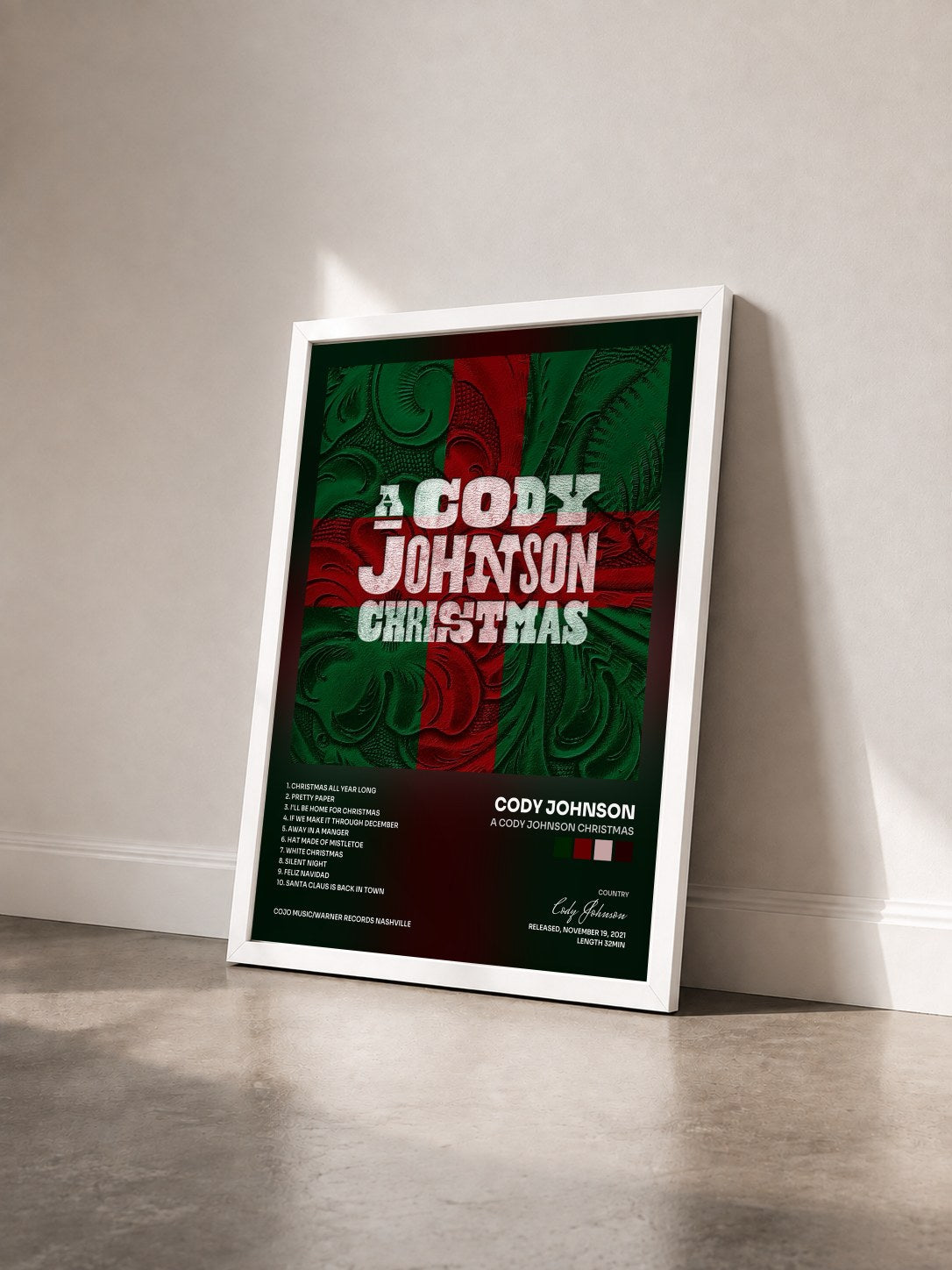 #blanc Tableau de l'album A Cody Johnson Christmas de Cody Johnson vu de trois quarts, cadre blanc