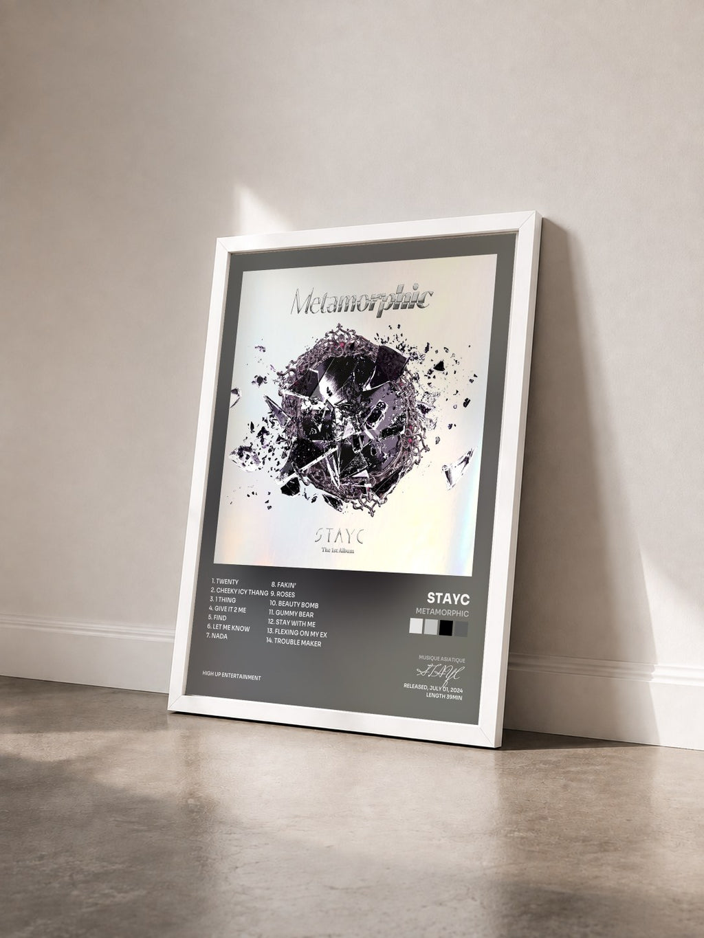 #blanc Metamorphic by STAYC as a framed art print seen at an angle, white frame