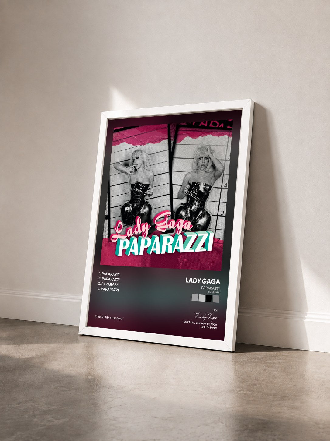 #blanc Tableau de l'album Paparazzi (Remixes EP) de Lady Gaga vu de trois quarts, cadre blanc