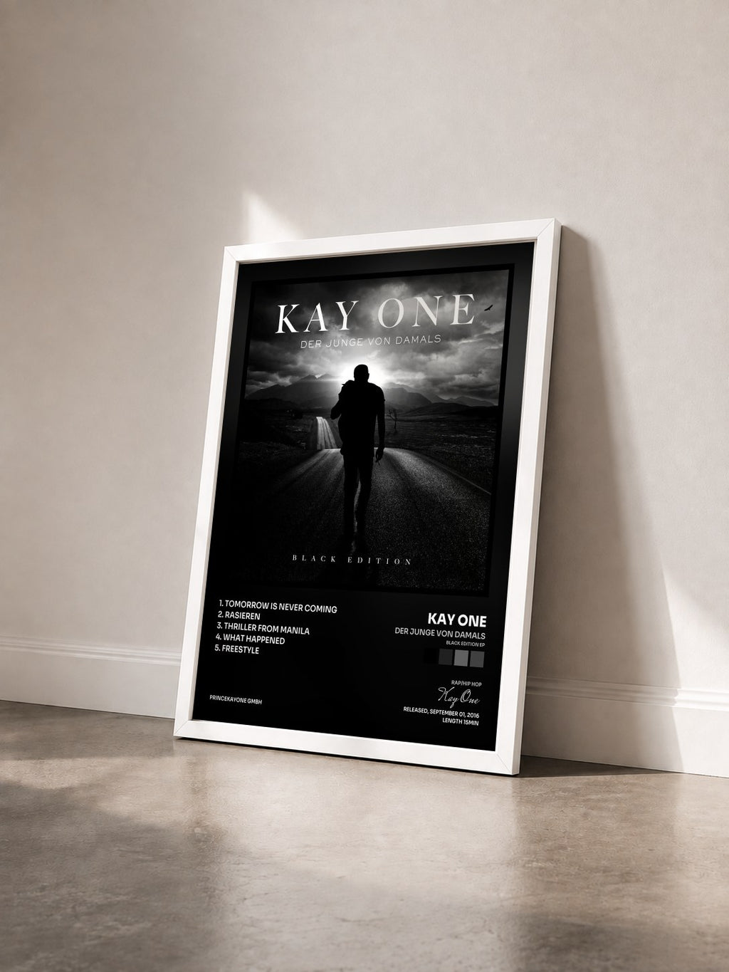 #blanc Der Junge von damals (Black Edition EP) by Kay One as a framed art print seen at an angle, white frame