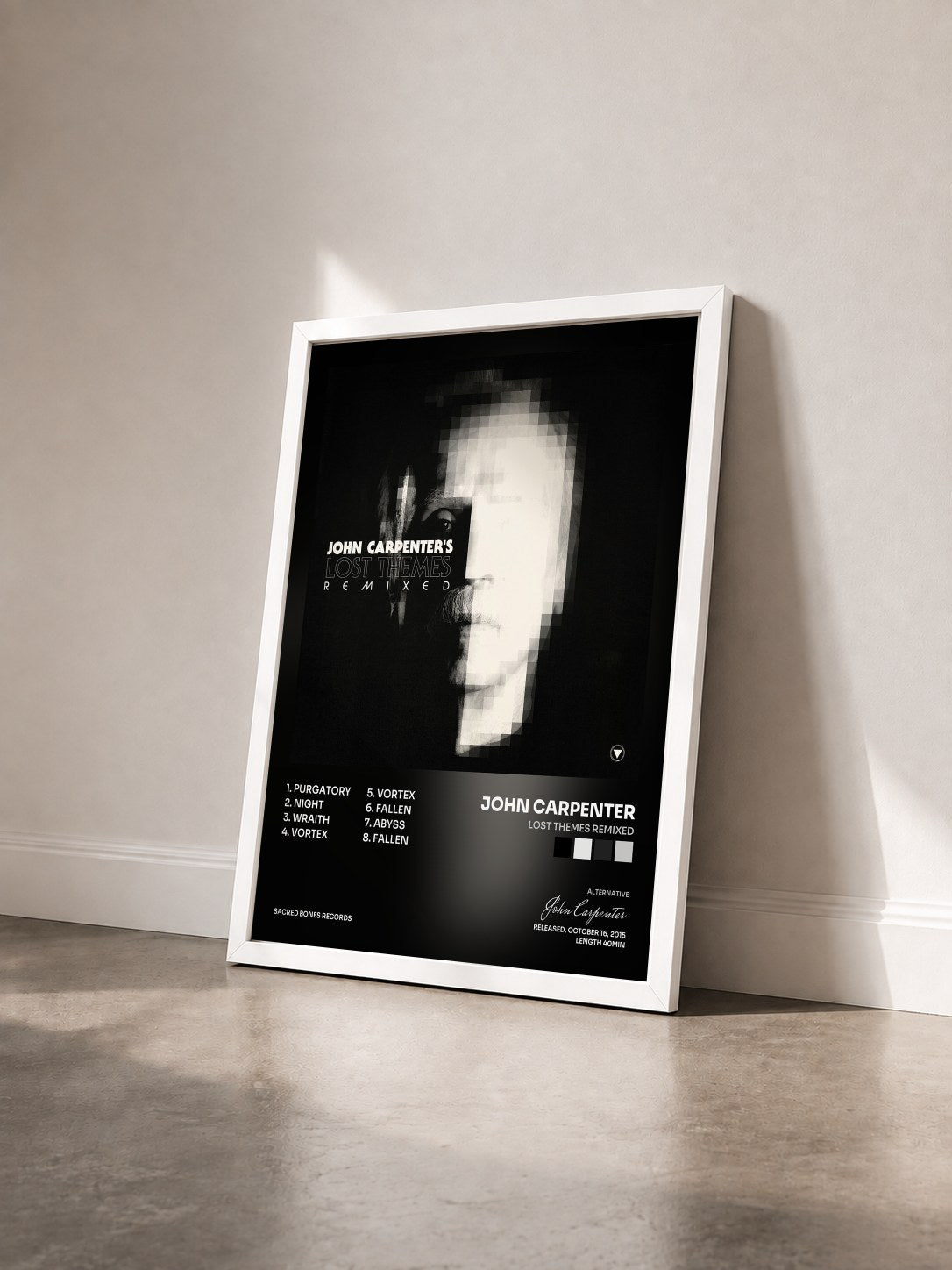 #blanc Tableau de l'album Lost Themes Remixed de John Carpenter vu de trois quarts, cadre blanc