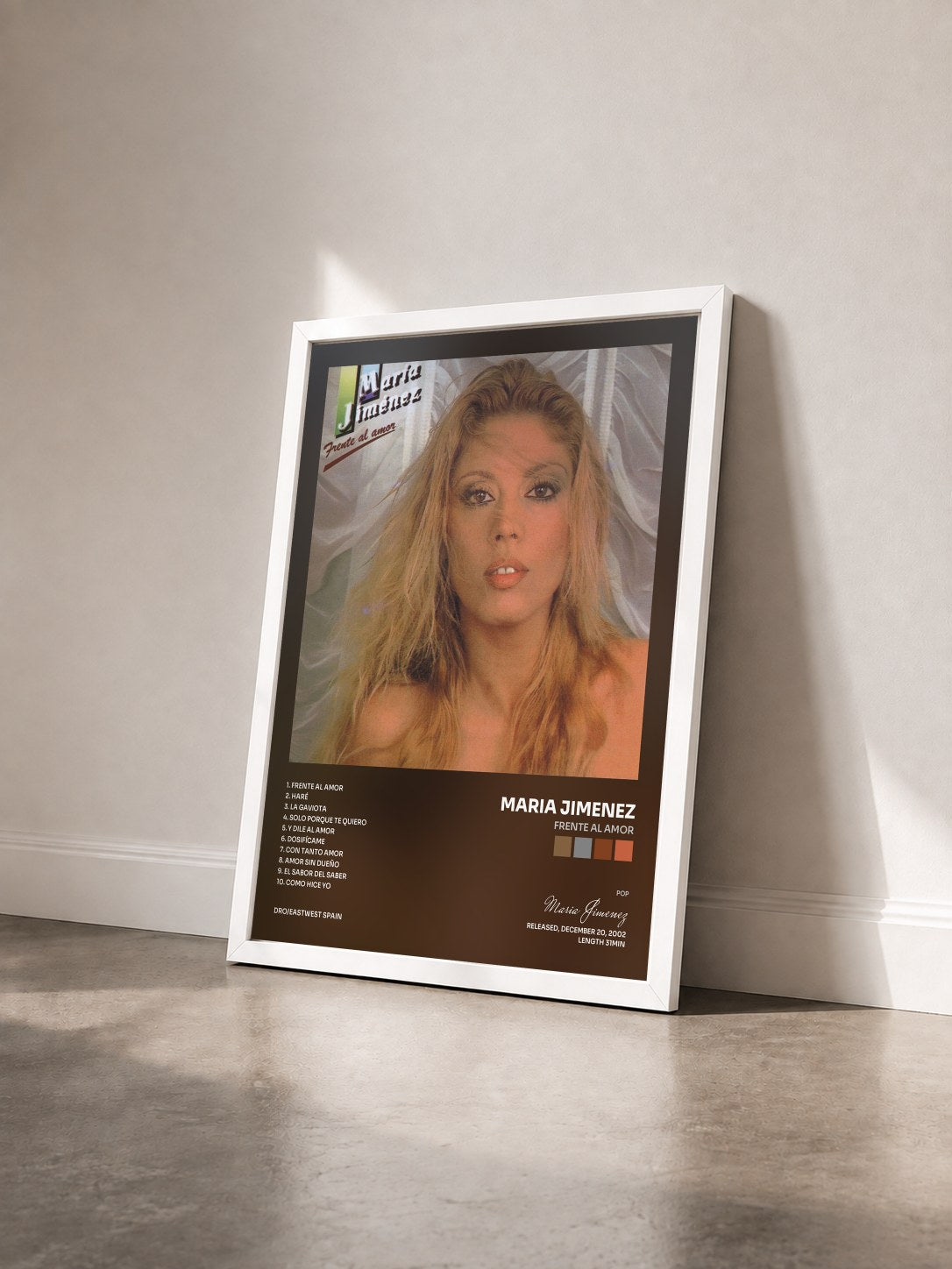 #blanc Tableau de l'album Frente al amor de Maria Jimenez vu de trois quarts, cadre blanc