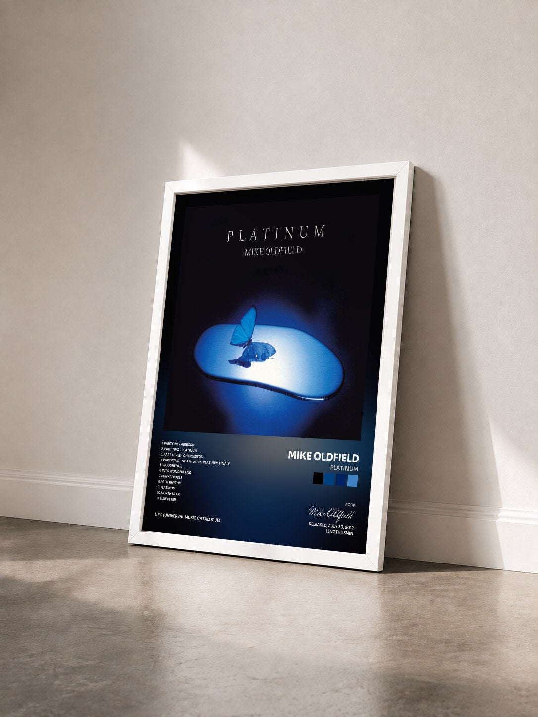 #blanc Tableau de l'album Platinum de Mike Oldfield vu de trois quarts, cadre blanc