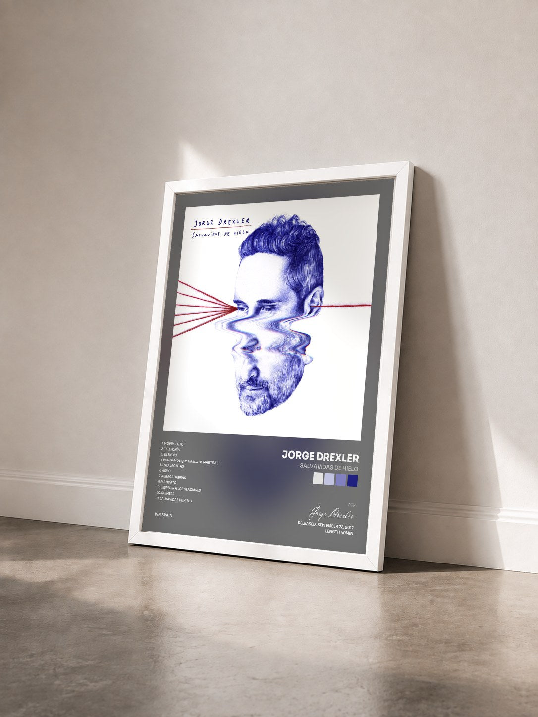 #blanc Tableau de l'album Salvavidas de hielo de Jorge Drexler vu de trois quarts, cadre blanc